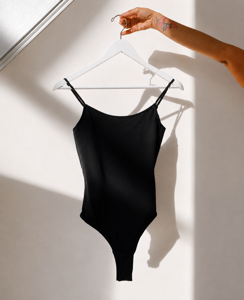 Black bodysuit on hanger